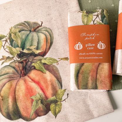 vintage pumpkin decorative pillow cover with a botanical-style pumpkin illustration in warm autumn colours.